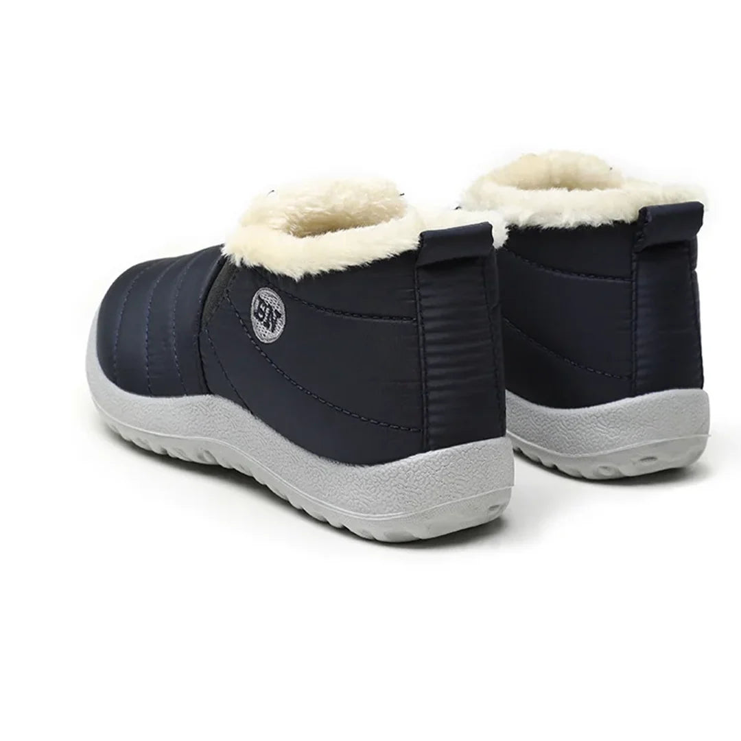 Women's navy quilted ankle boots – back view