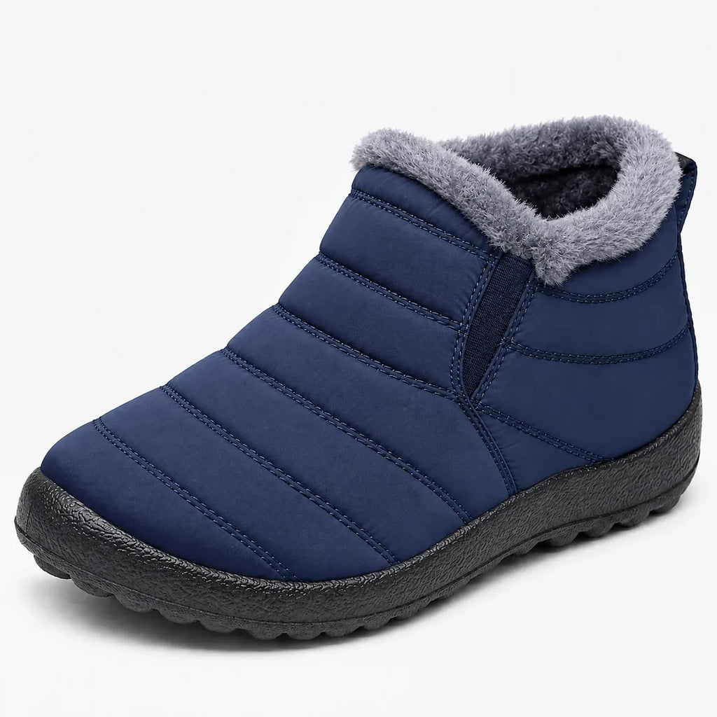 Women's navy quilted ankle boot with grey collar