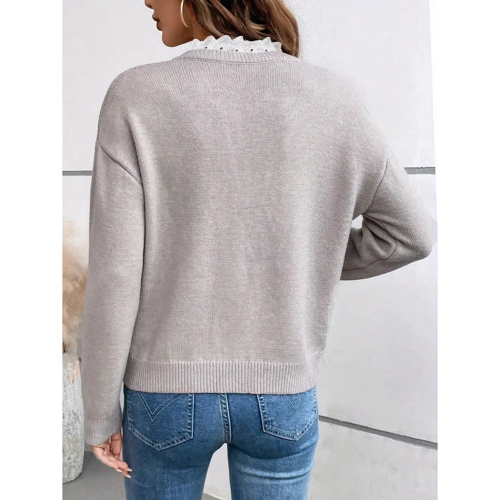 Women's v-neck sweater with lace trim in light grey, back view