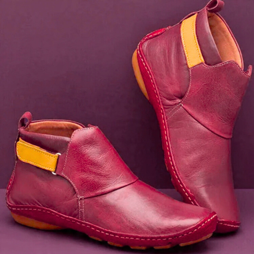 Women's red fold-over ankle boots with strap