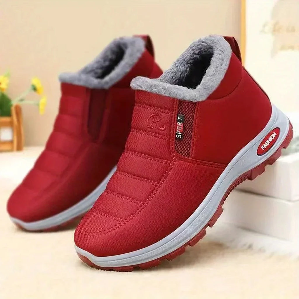 Pair of women's red winter ankle boots