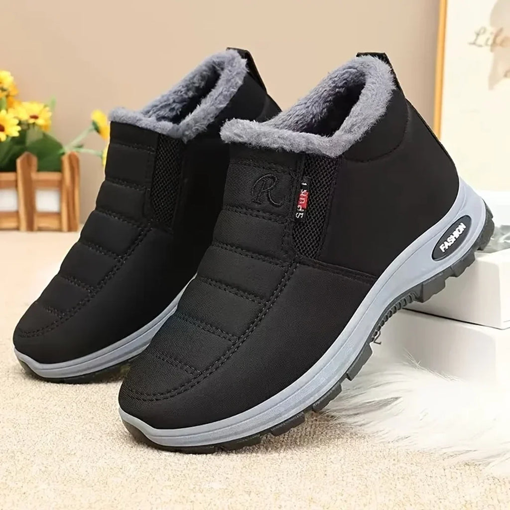 Pair of women's black winter ankle boots