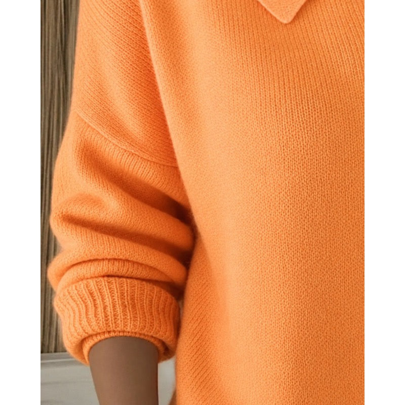 Orange cardigan – close-up of the ribbed cuff