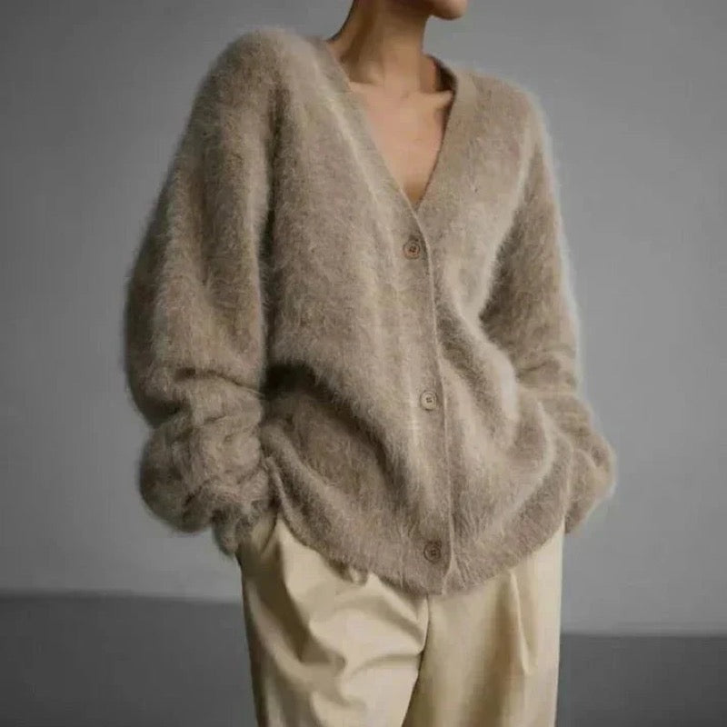 Women's beige fluffy V-neck cardigan with cream trousers