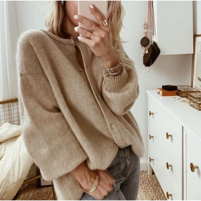 Beige oversized knit cardigan with dropped shoulders