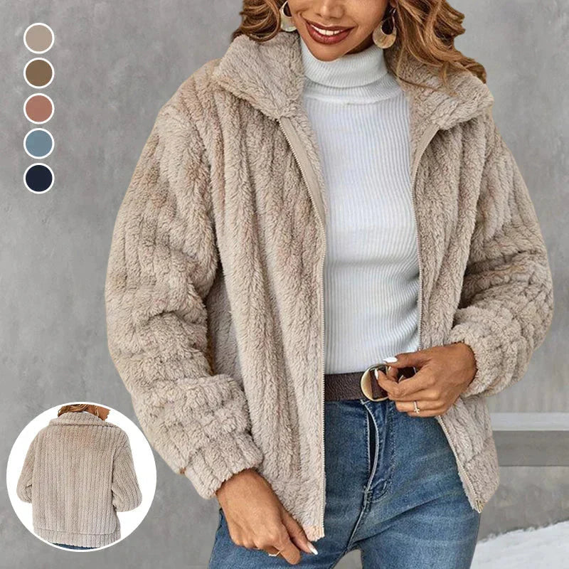 Beige plush jacket with high collar worn open