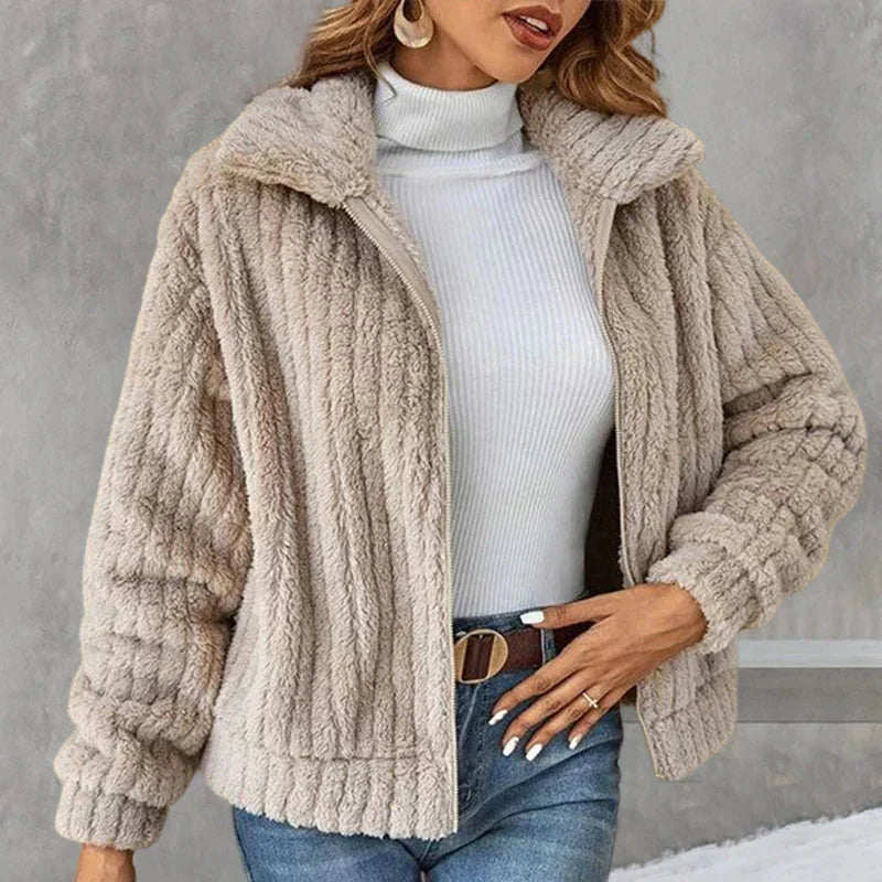 Beige ribbed plush jacket worn open