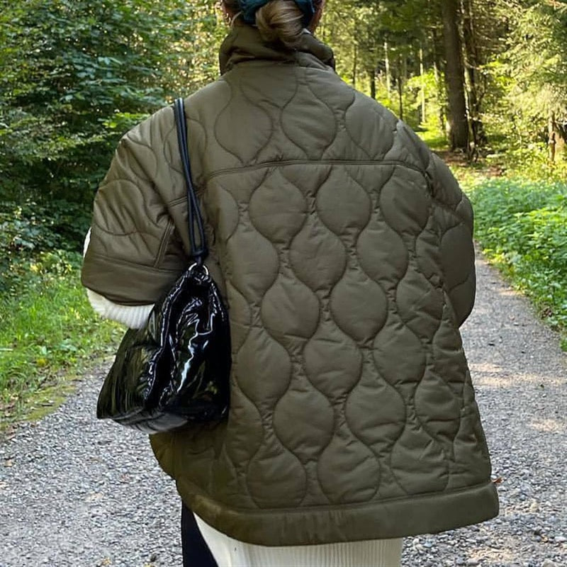 Olive green quilted cape jacket – back view with onion quilting