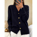 Black V-neck cardigan with gold heart buttons
